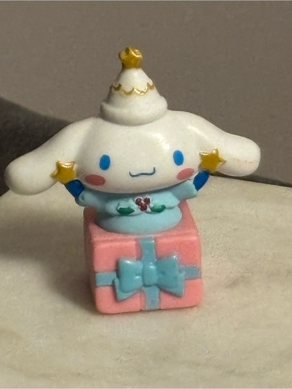 Tiny Sanrio Cinnamoroll Figure on Pink Gift with Blue Bow - White, Pink & Blue